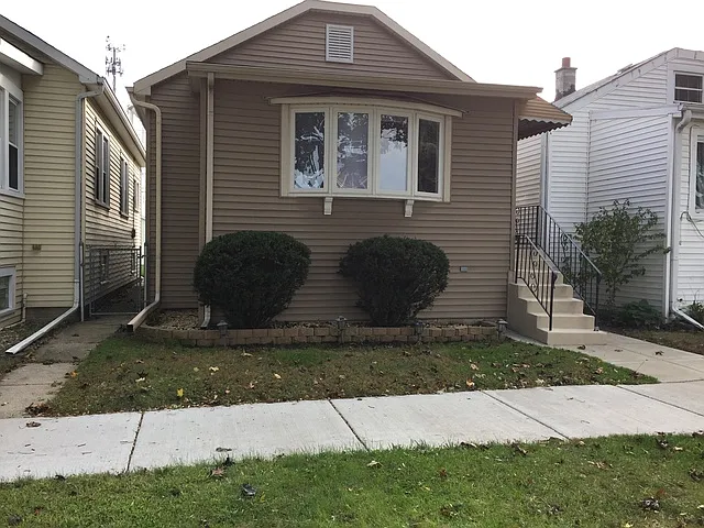 7311 W 58th Pl photo 1