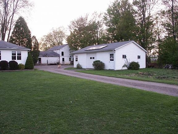 barn with shed and garage