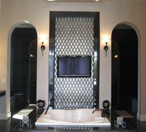 Sunk in jetted tub with TV