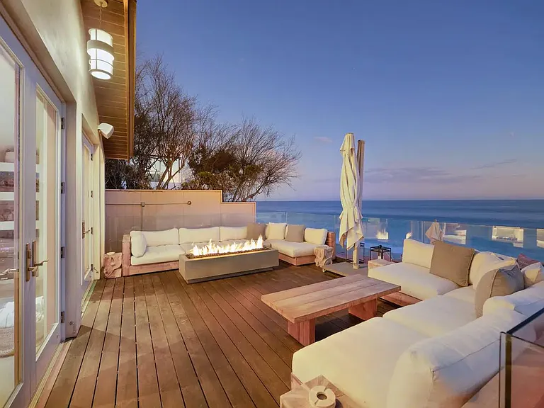 Watch the stars from the beachfront deck.