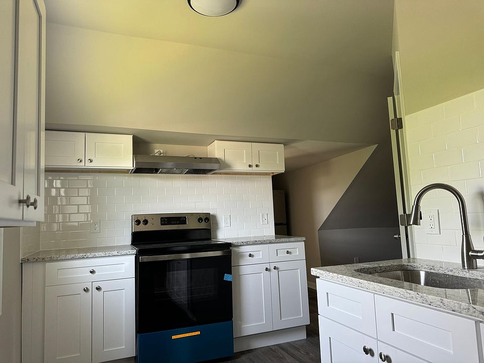 New kitchen with no-slam cabinets and granite countertops