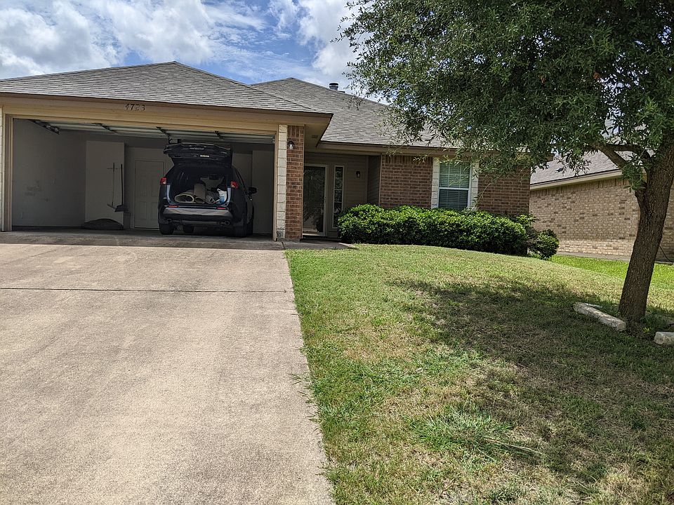 Large Garage and well maintained front yard