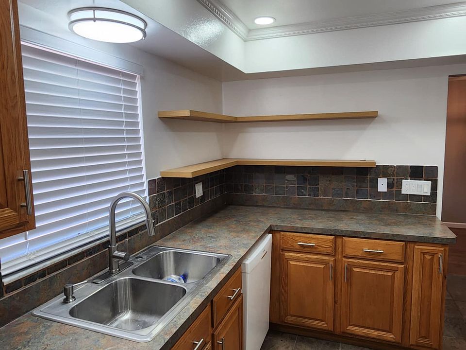 Modern open shelve concept in the kitchen and led lighting.