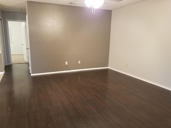 Those are hardwood floors in main area. Ceramic in the kitchen and carpet in the bedrooms.