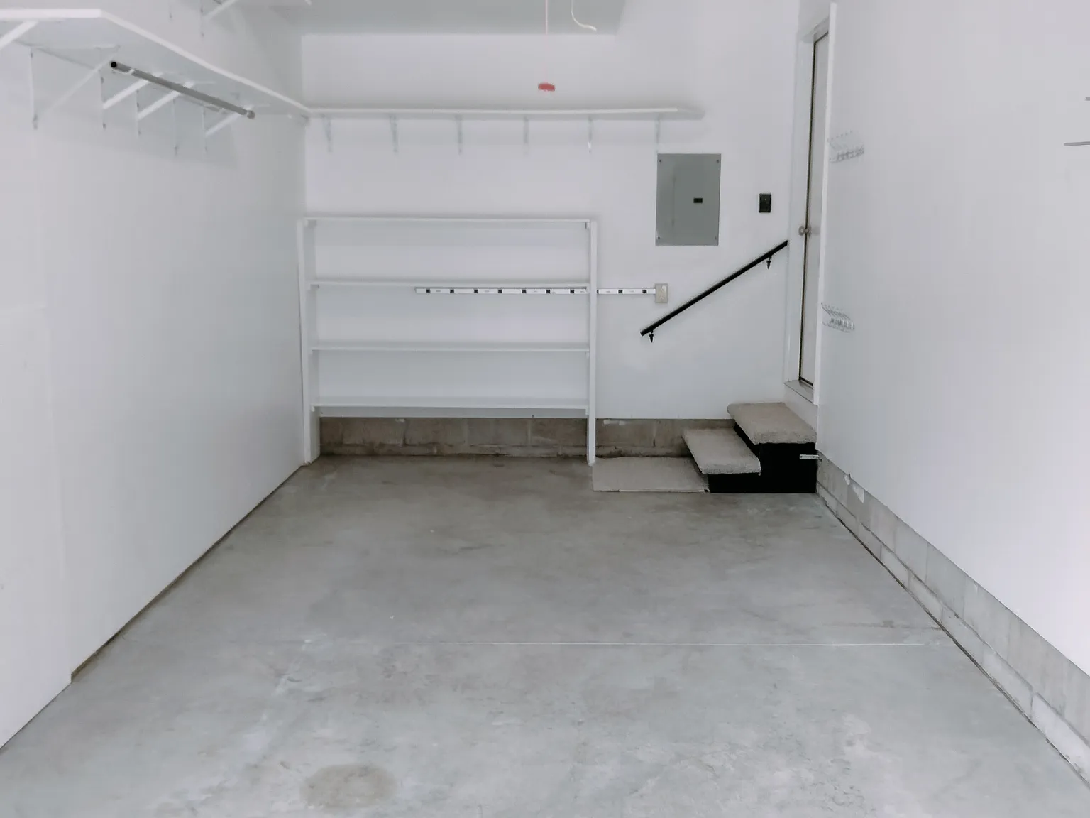 3 Step Entry from Garage in rear where parking is (No other steps inside unit). Keyless & remote garage door entry. All locks & deadbolts keyed alike.
