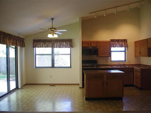 Bright and spacious breakfast room with slider to patio
