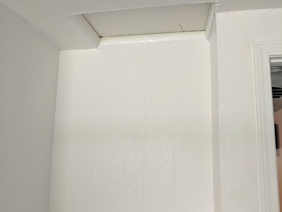 Crawl space in bedroom ceiling