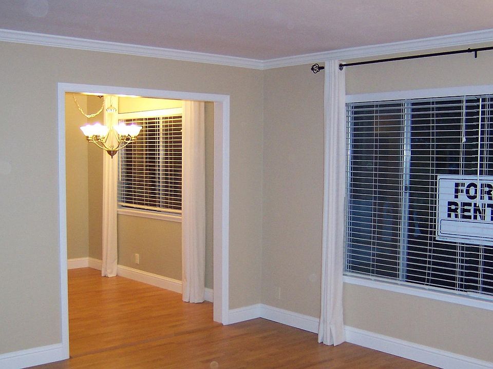 Living room looking into eat in kitchen