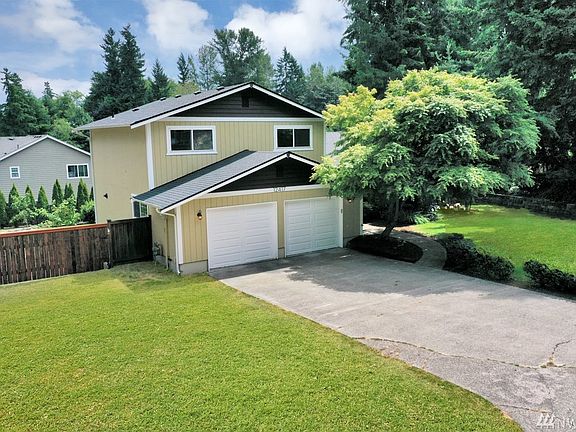 Large fully fenced yard ~ RV parking ~ 2 Car Garage.