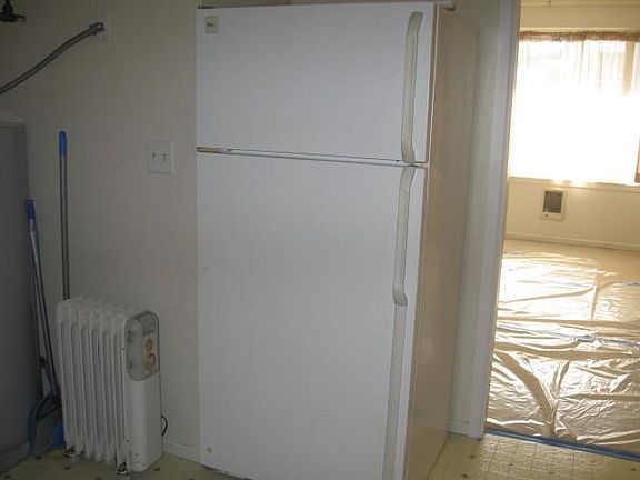 Kitchen, with view into Living Room