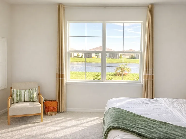 Pond view outside primary bedroom with built in ironing board