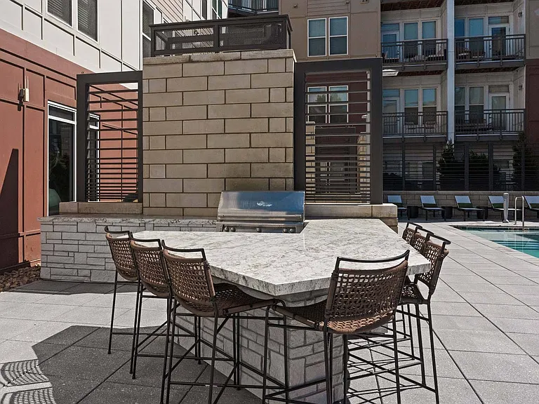 Fire up the grill and savor delicious moments at our outdoor cooking station.