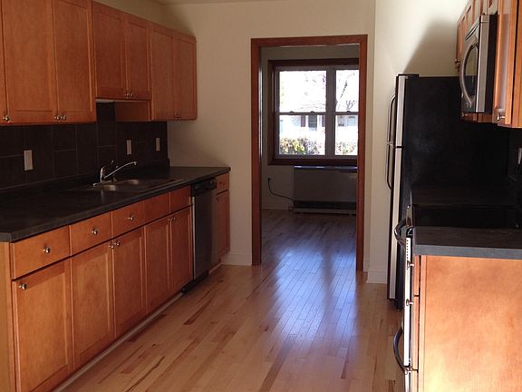 Kitchen looking into living room