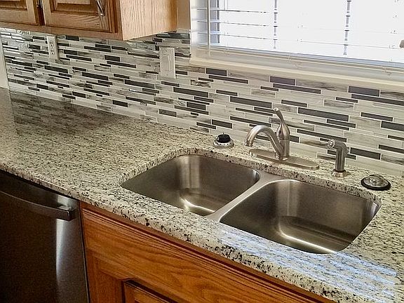 New granite, sink & tile