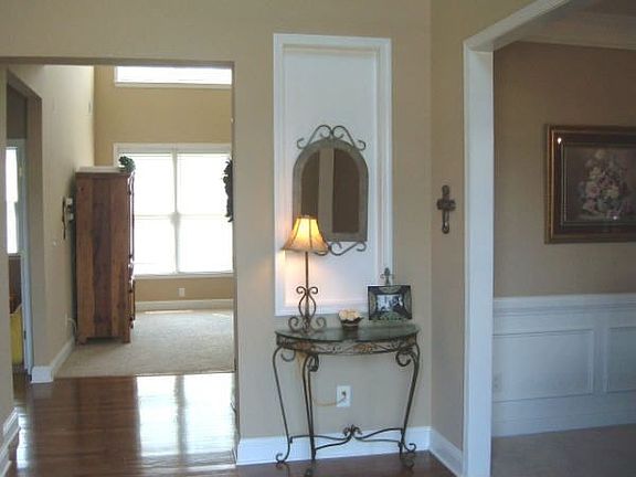 Two-Story Foyer with hardwood Floors