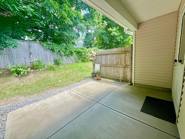 Private Patio/Partially Covered; Accessed Through Kitchen