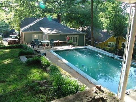 Huge back yard with POOL and outdoor Fireplace!!