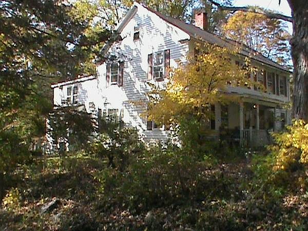 Main house showing apartment entrance on left