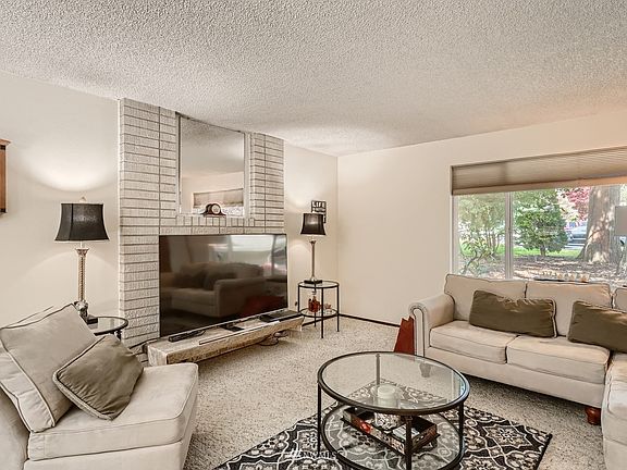 The fireplace that's currently behind the TV is gas, but it also can burn wood for the whole romantic get-a-way feel.