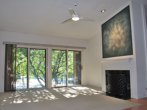 Bright Living Room with Vaulted Ceilings and Gas Fireplace
