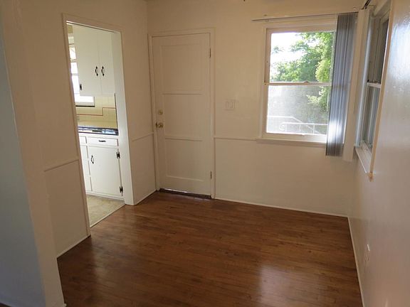 Dining Area, Door Leads to Balcony & Stairs to Backyard/Down