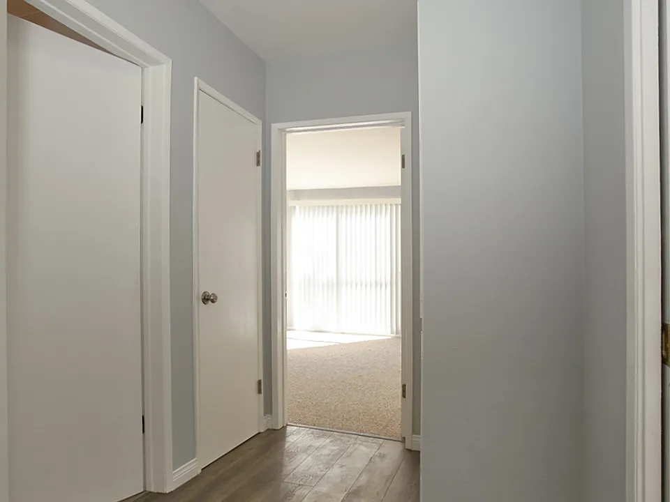 Hallway to front bedroom and hallway bathroom