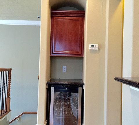 Dry bar area with wine fridge