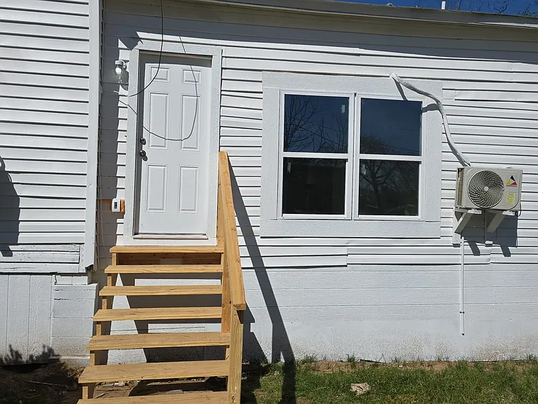 Right side of house/ master bedroom exit to yard