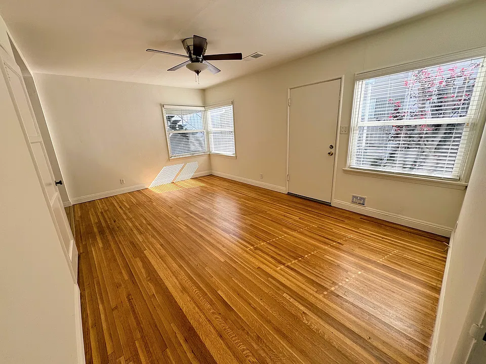 Living room - front door also opens to a retractable pull out screen door for additional light and air