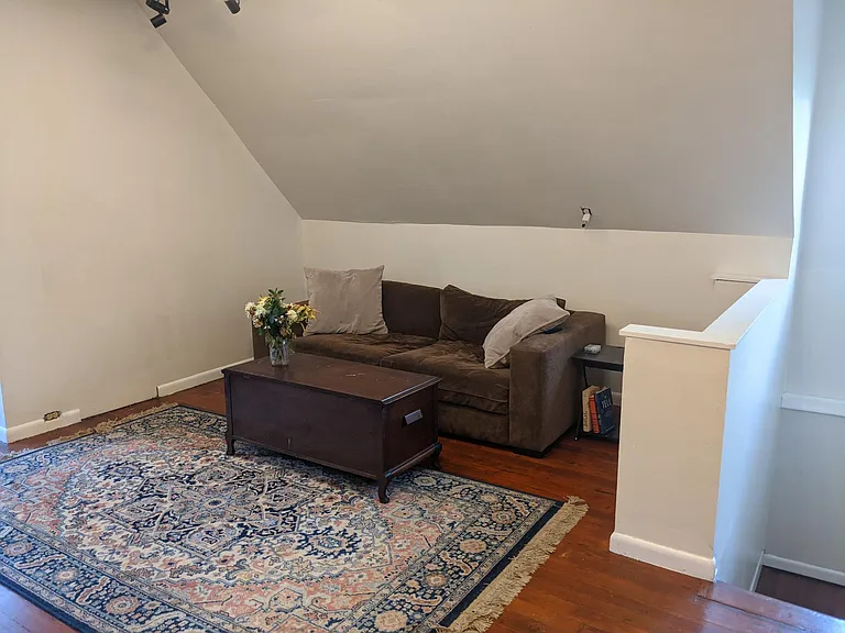 Third floor living space couch area