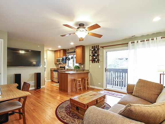 Bright living room with French doors to balcony!