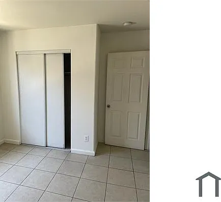 10026 S San Pedro St — Photo 4