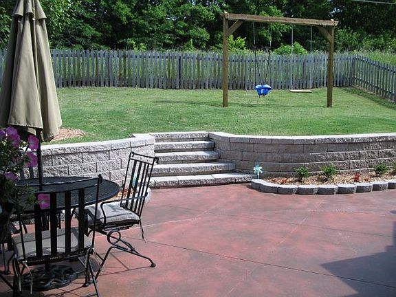 Stained Concrete, landscaping, backs to greenbelt