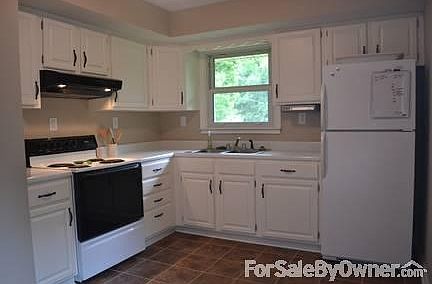 Refinished cabinets, new flooring