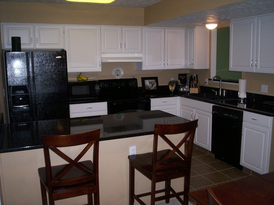 kitchen- new granite, ceramic floor, paint, and appliances