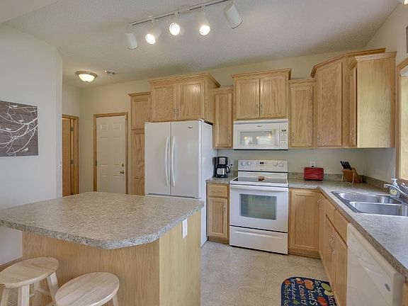 4th image of 12161 Xylite St NE Unit D