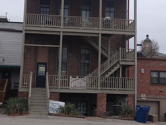 Porch on river side, entry to 2nd floor from parking area.