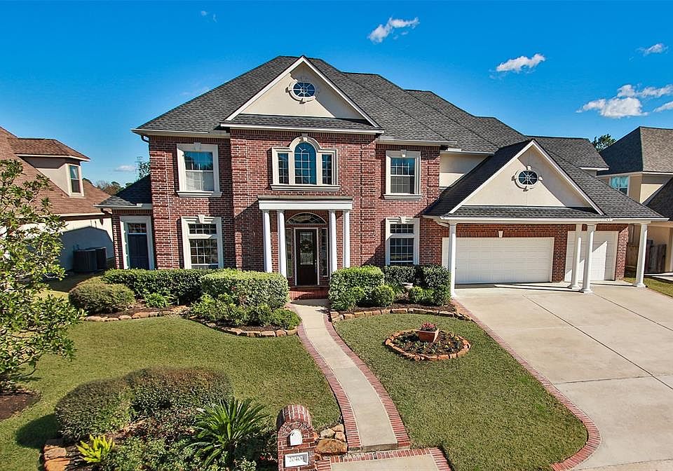 Spectacular custom home situated on a premium golf course lot in the desirable "Links" section of Windrose!