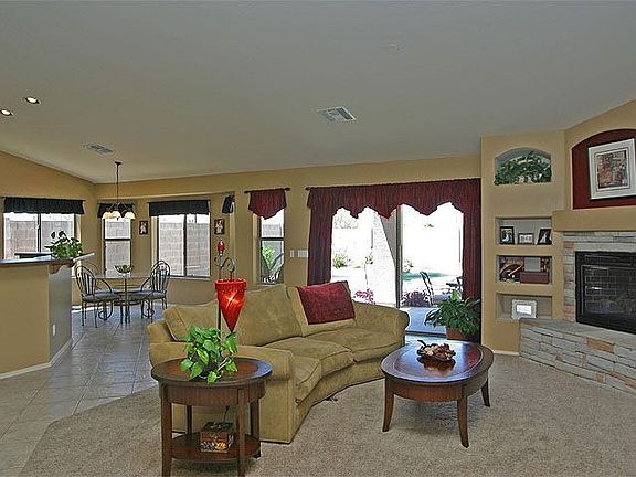 Great room and view of breakfast nook with bay window