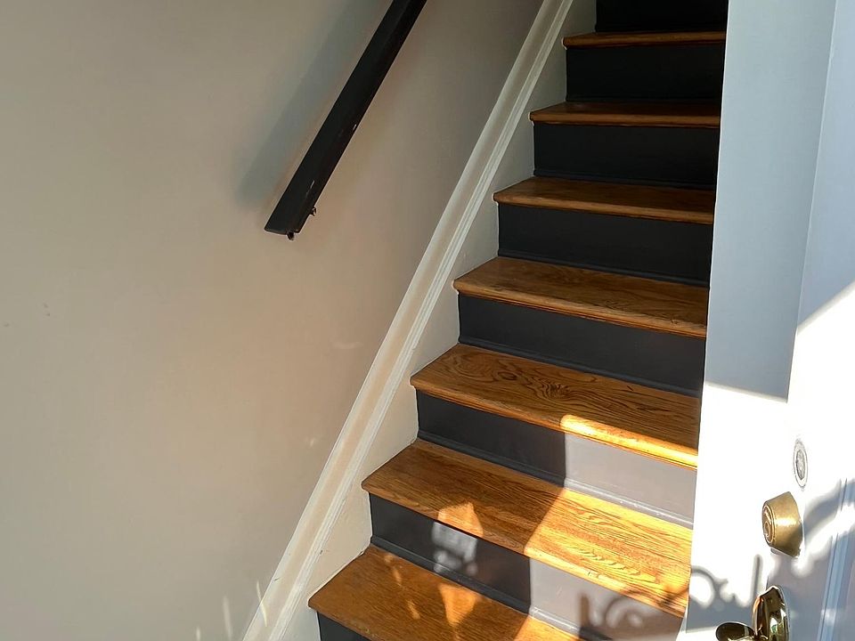 Stairs at front door leading up to the living space