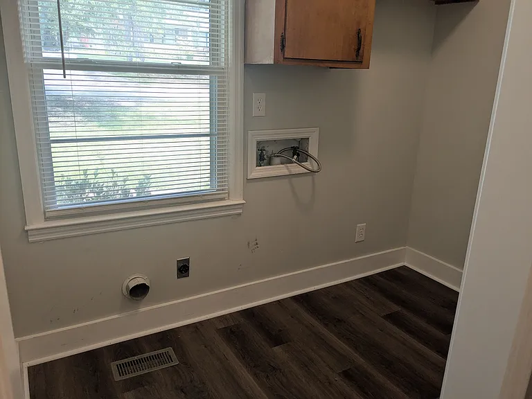 Laundry room attached to the master bedroom