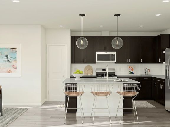 Kitchen with center island and pendant lighting