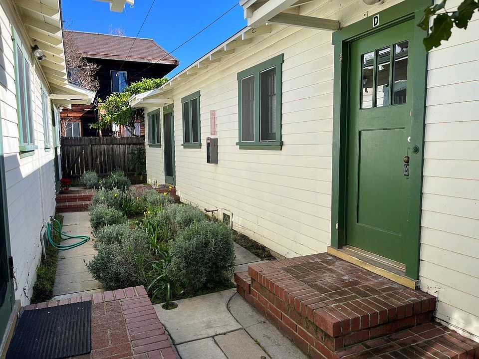 Front door off of rear courtyard