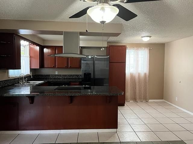Kitchen stainless steal w marble counter tops