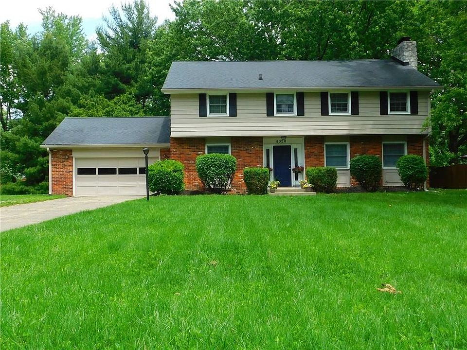 Freshly painted exterior siding, and low maintenance brick.