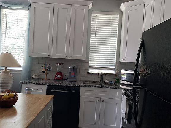 Full kitchen (refrigerator, oven, microwave, iced and hot coffeemaker, blender, dishwasher, plates, pots,cups etc)