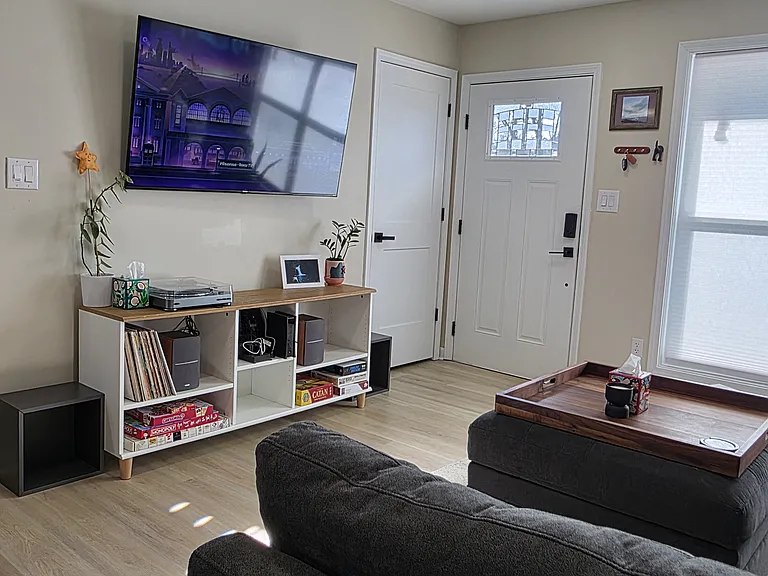 Entertainment stand and smart TV -perfect for a cozy movie night.