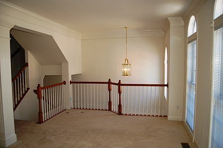 Living room overlooking entry foyer