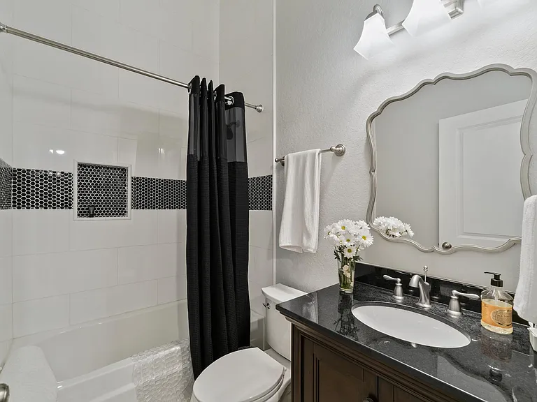 Stunning bathroom w/tub-shower combo.