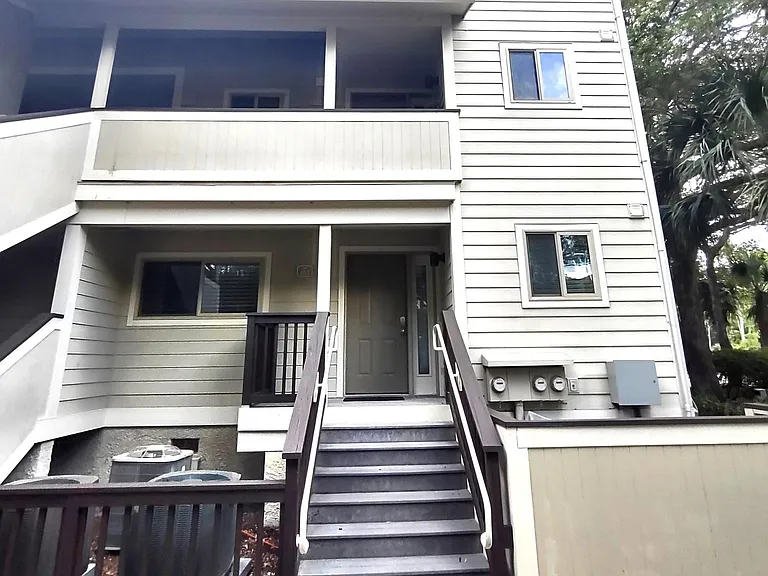 1st floor corner unit, parking in front of unit